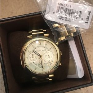 Michael Kors women’s gold watch